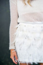 Fun and flirty mini skirt encrusted with naturally fallen feathers, diamantes and tiny beading. Perfect to change into to party the night away. The Le Grand bridal skirt can be paired with anything from a cami vest top to a snug jumper for winter weddings.