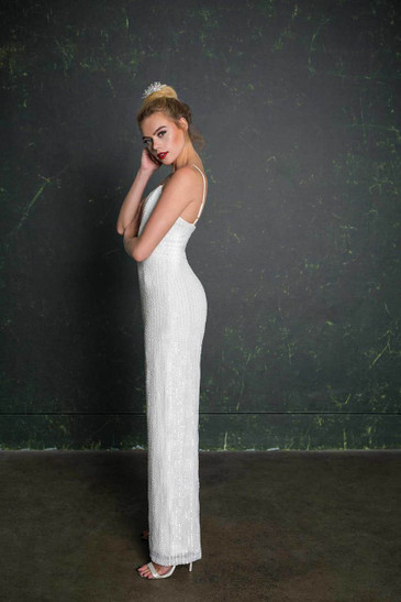 Stunning, embellished bridal jumpsuit. With super sexy straps, subtle wide trouser legs and nipped in at the waist, this beautiful bridal jumpsuit is handmade in London.