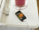 The top lid flips up to reveal a charging station.